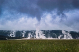 Here is Geyser Basin from a half a mile away. I love the way the steam was interacting with the storm clouds